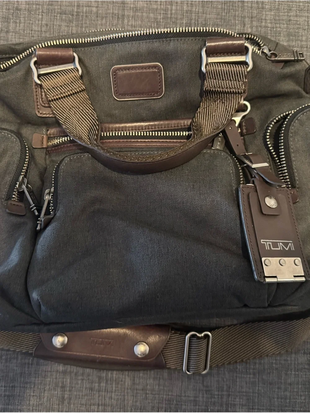 Tumi Black Canvas Messenger Bag with Brown Leather Trim